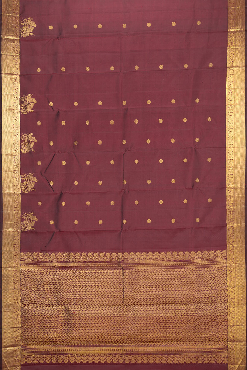 Flat view of Pure Silk Maroon Kanjivaram Saree with Zari Butta on the body and Zari Border. 