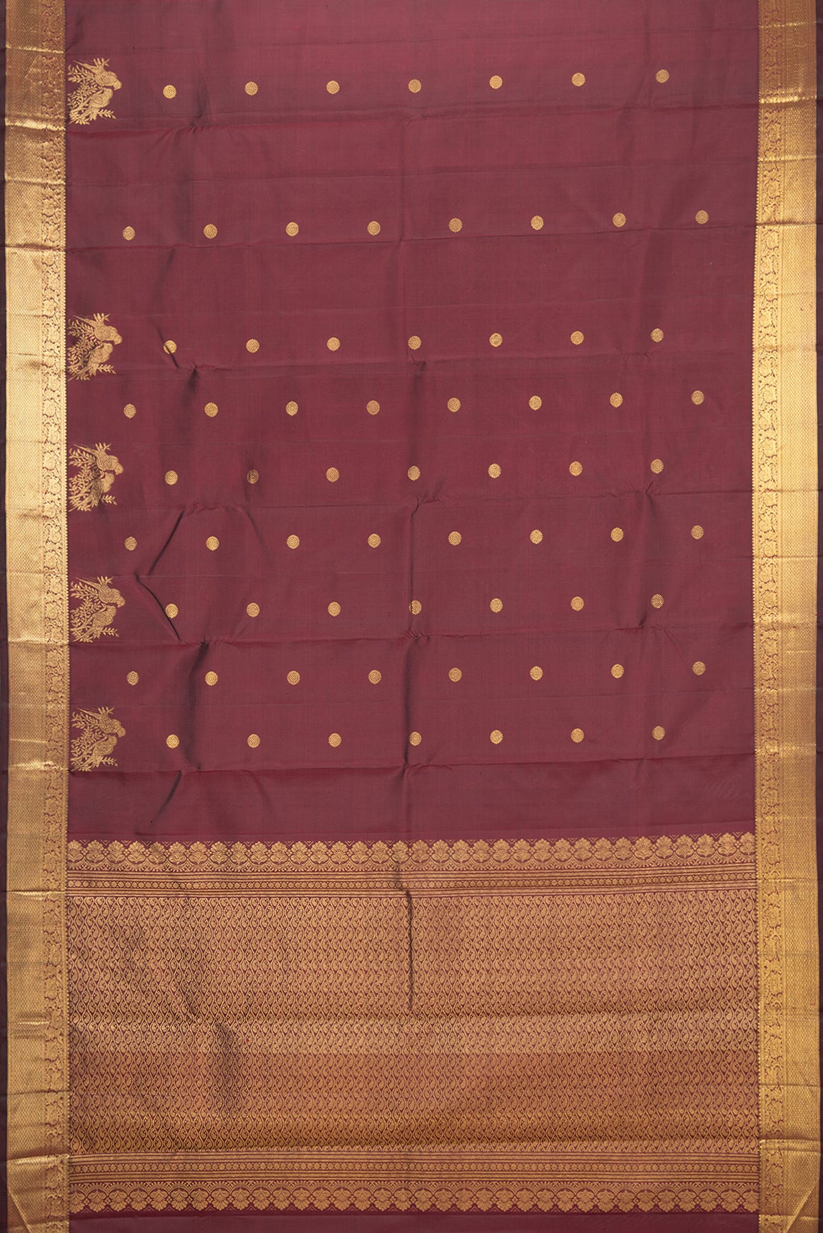 Flat view of Pure Silk Maroon Kanjivaram Saree with Zari Butta on the body and Zari Border. 