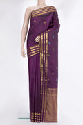 Pure Silk Purple Kanchipuram Saree with Thread Butta on the body and Zari Border.  displayed on a mannequin