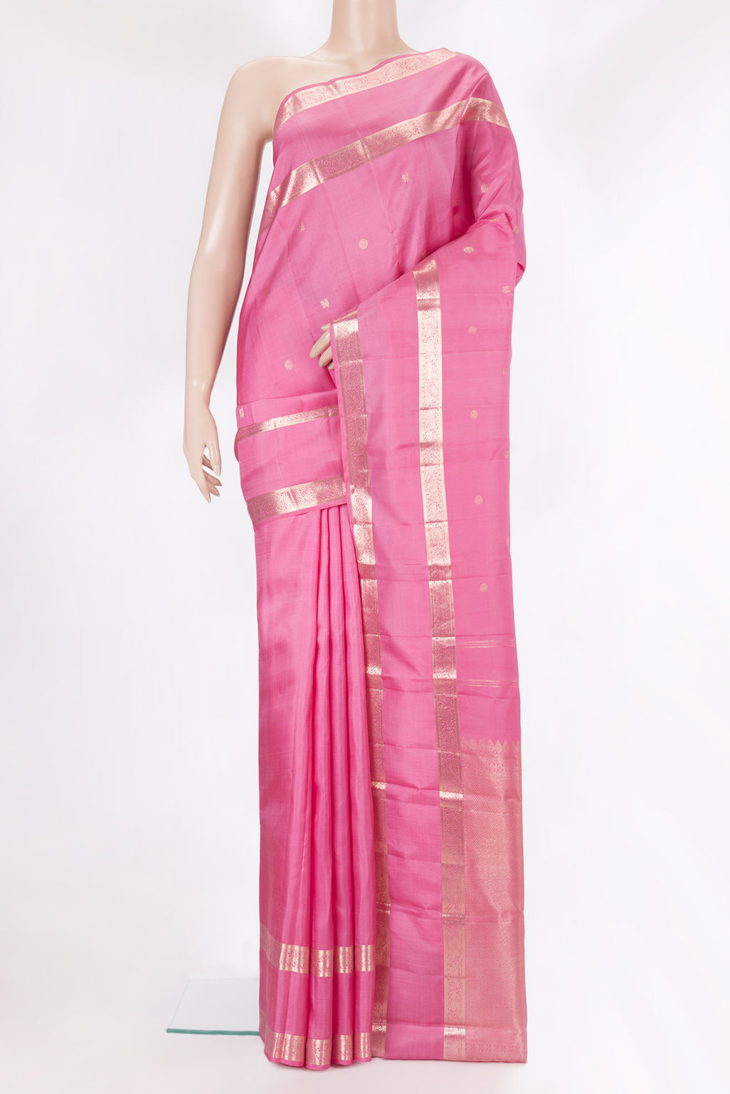 Pure Silk Rose pink Kanchipuram Saree with Zari Butta on the body and Zari Border.  displayed on a mannequin