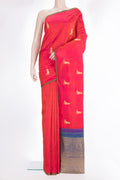 Pure Silk Red Dual Tone Kanchipuram Saree with Zari Butta on the body and Without Border.  displayed on a mannequin