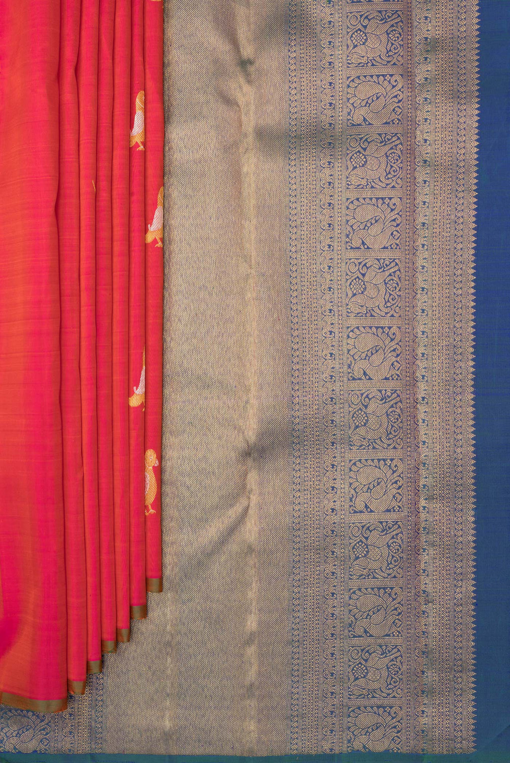 Pleats and pallu of Pure Silk Red Dual Tone Kanchipuram Saree with Zari Butta on the body and Without Border. 