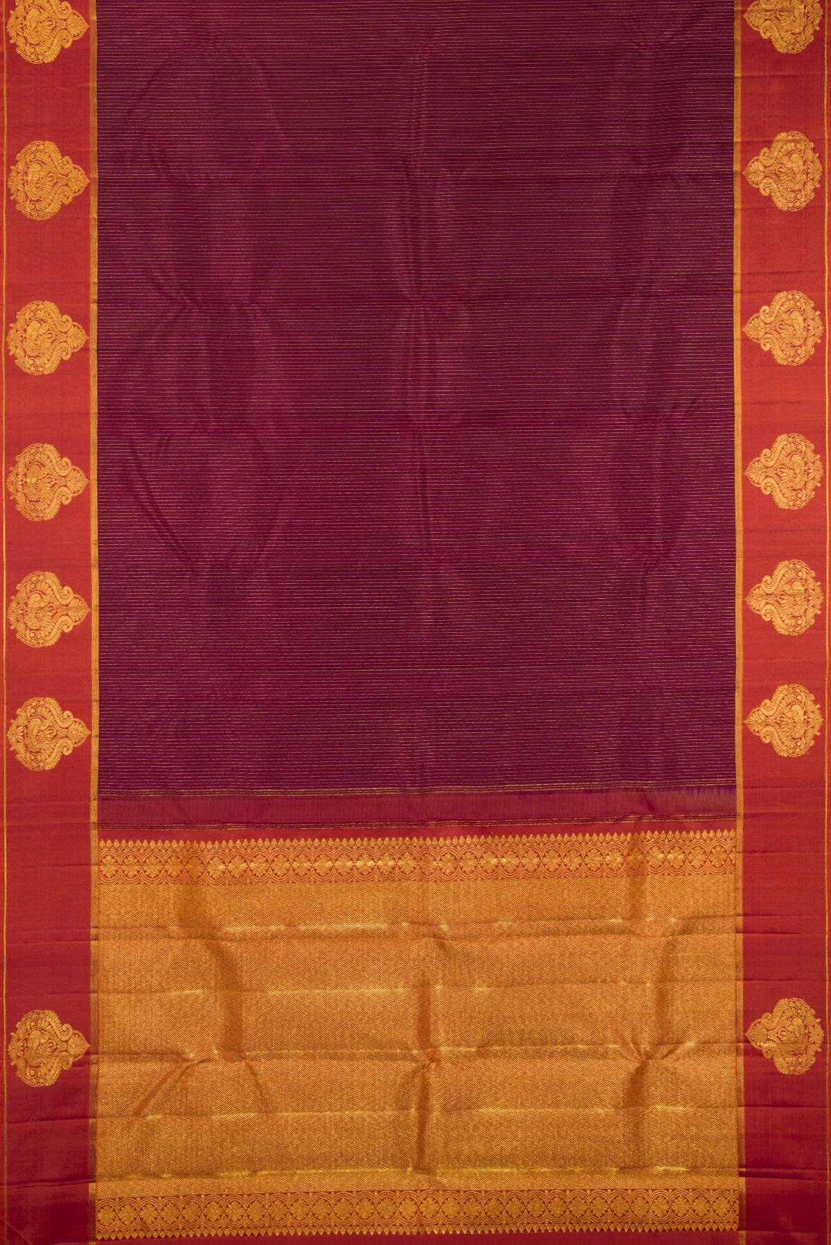 Flat view of Pure Silk Maroon Kanchipuram Saree with Stripes on the body and Fancy Border. 