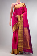 Pure Silk Pink Kanjivaram Saree with Stripes on the body and Zari Border.  displayed on a mannequin