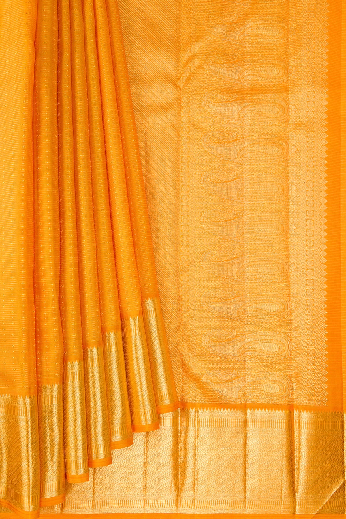 Pleats and pallu of Pure Silk Mustard Kanjivaram Saree with Stripes on the body and Zari Border. 