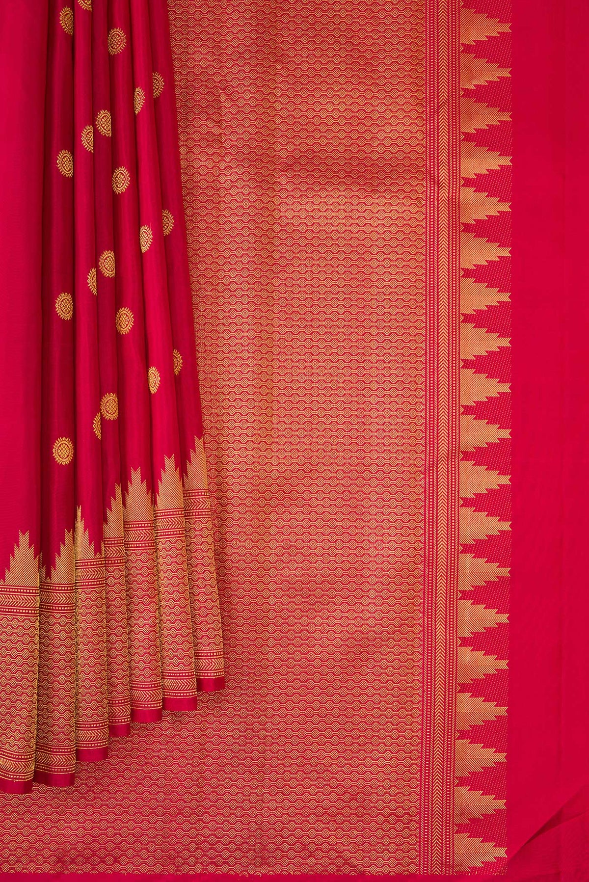 Pleats and pallu of Pure Silk Deep Red Kanjivaram Saree with Zari Butta on the body and Fancy Border. 