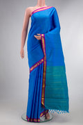 Pure Silk Royal Blue Kanchipuram Saree with Plain Body and Zari Border.  displayed on a mannequin