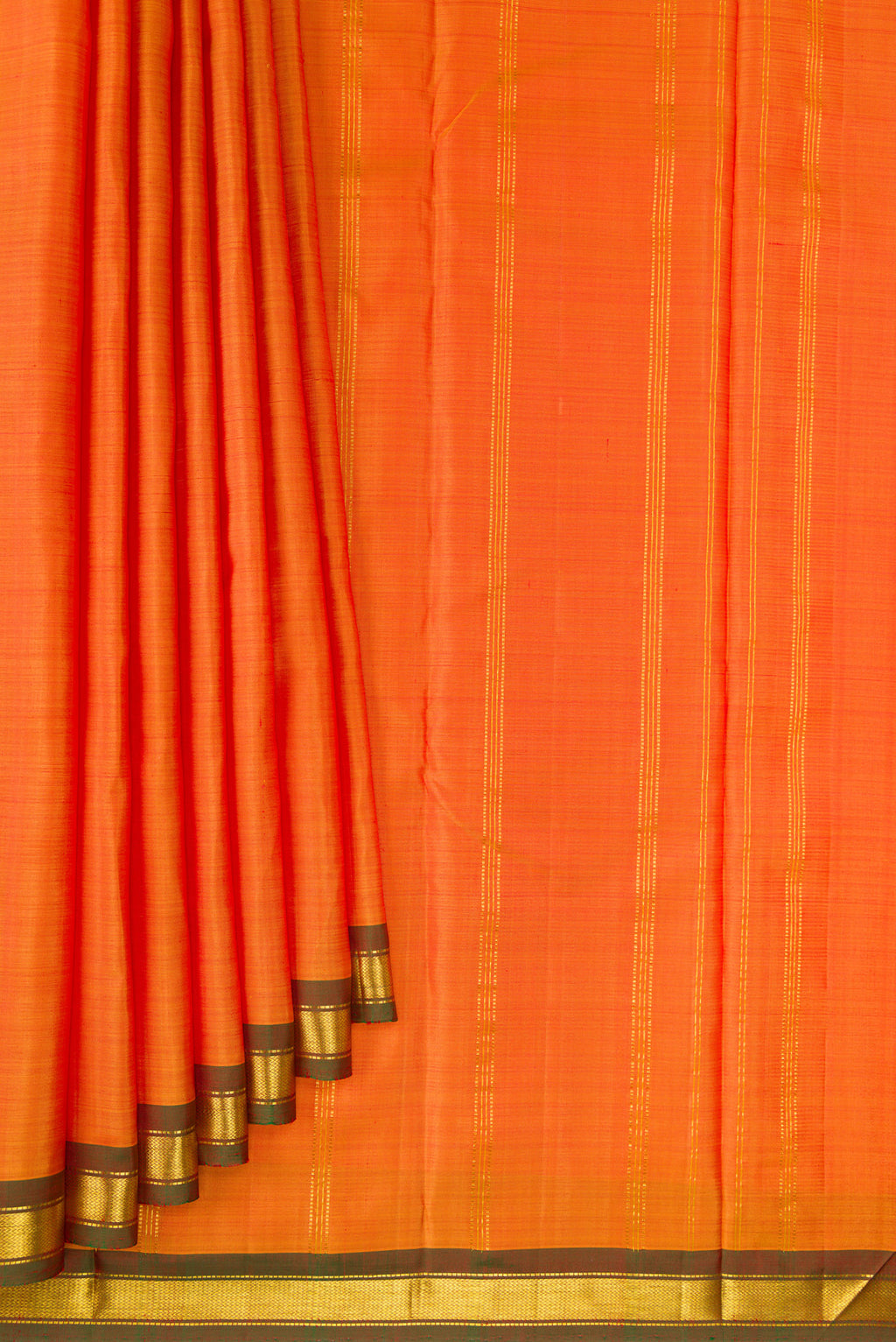 Pleats and pallu of Pure Silk Orange Dual Tone Kanchipuram Saree with Plain Body and Zari Border. 