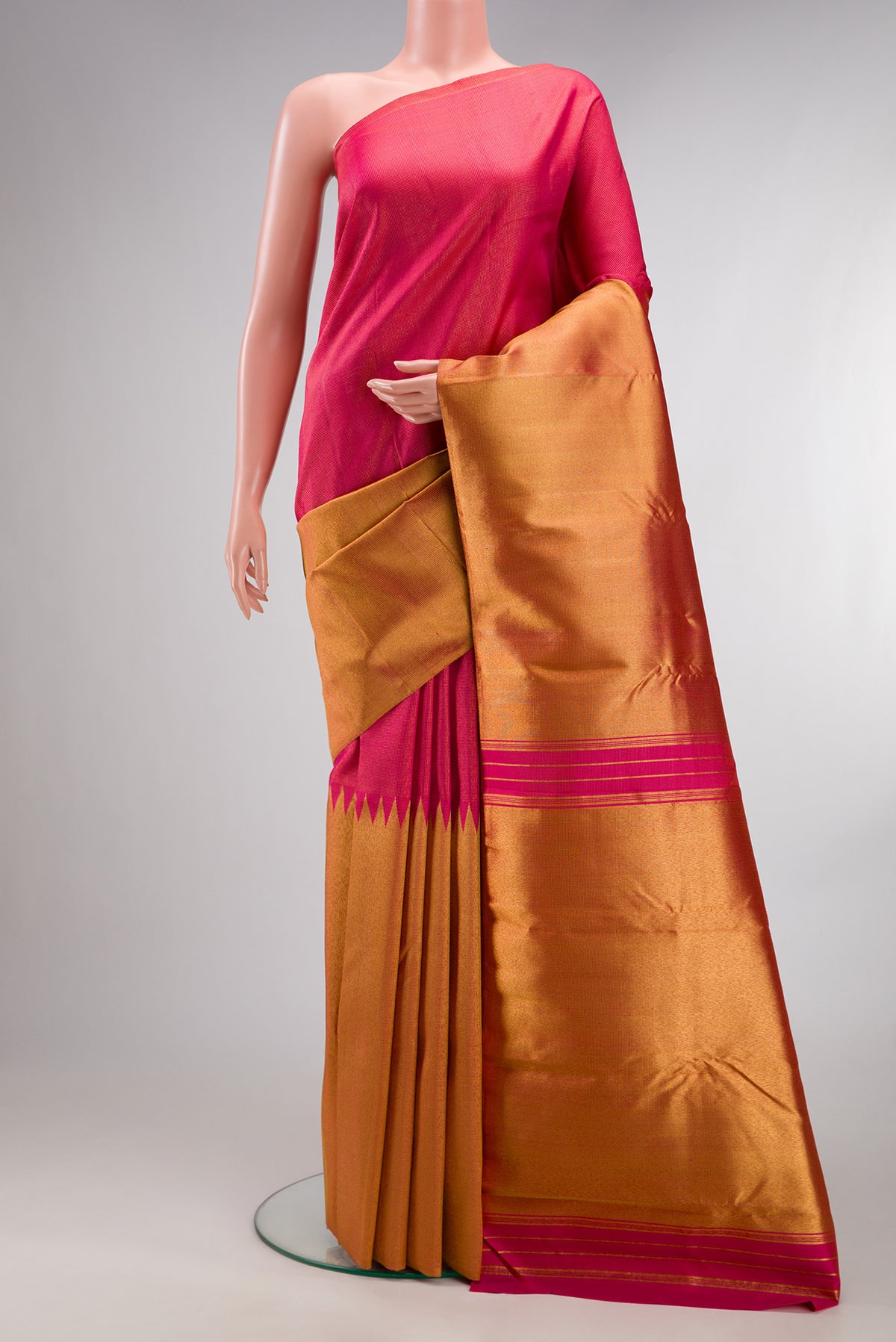 Pure Silk Pink Kanchipuram Saree with Half And Half on the body and Without Border.  displayed on a mannequin