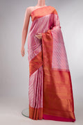 Pure Silk Pink Dual Tone Kanchipuram Saree with Zari Brocade on the body and Zari Border.  displayed on a mannequin