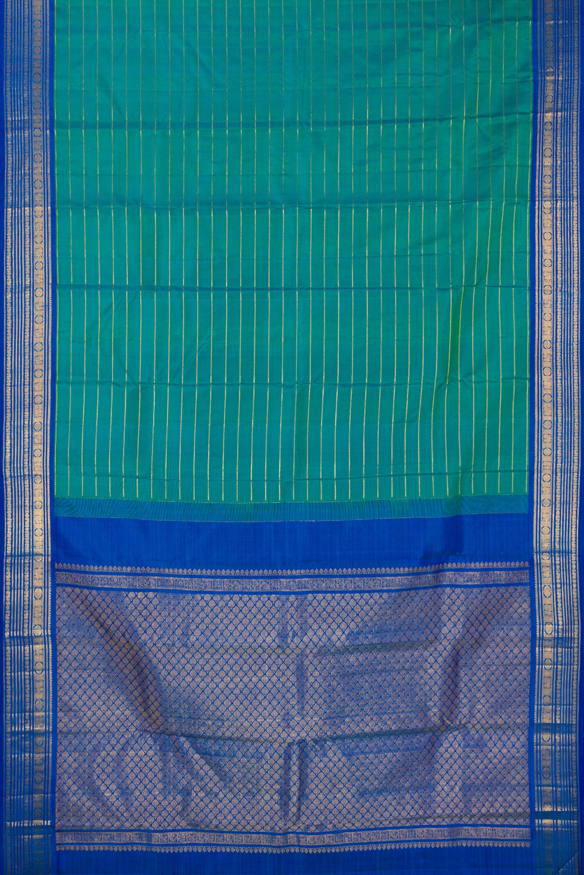 Flat view of Pure Silk Peacock Blue Dual Tone Kanchipuram Saree with Veldhari on the body and Zari Border. 
