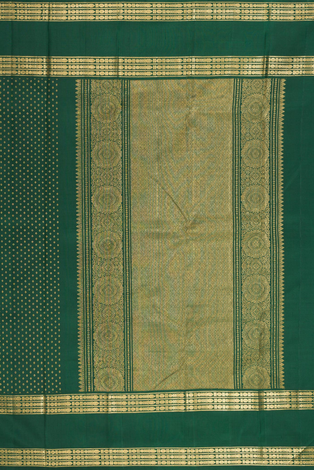 Close up image of the pallu of Pure Silk Green Kanjivaram Saree with Zari Butta on the body and Zari Border. 