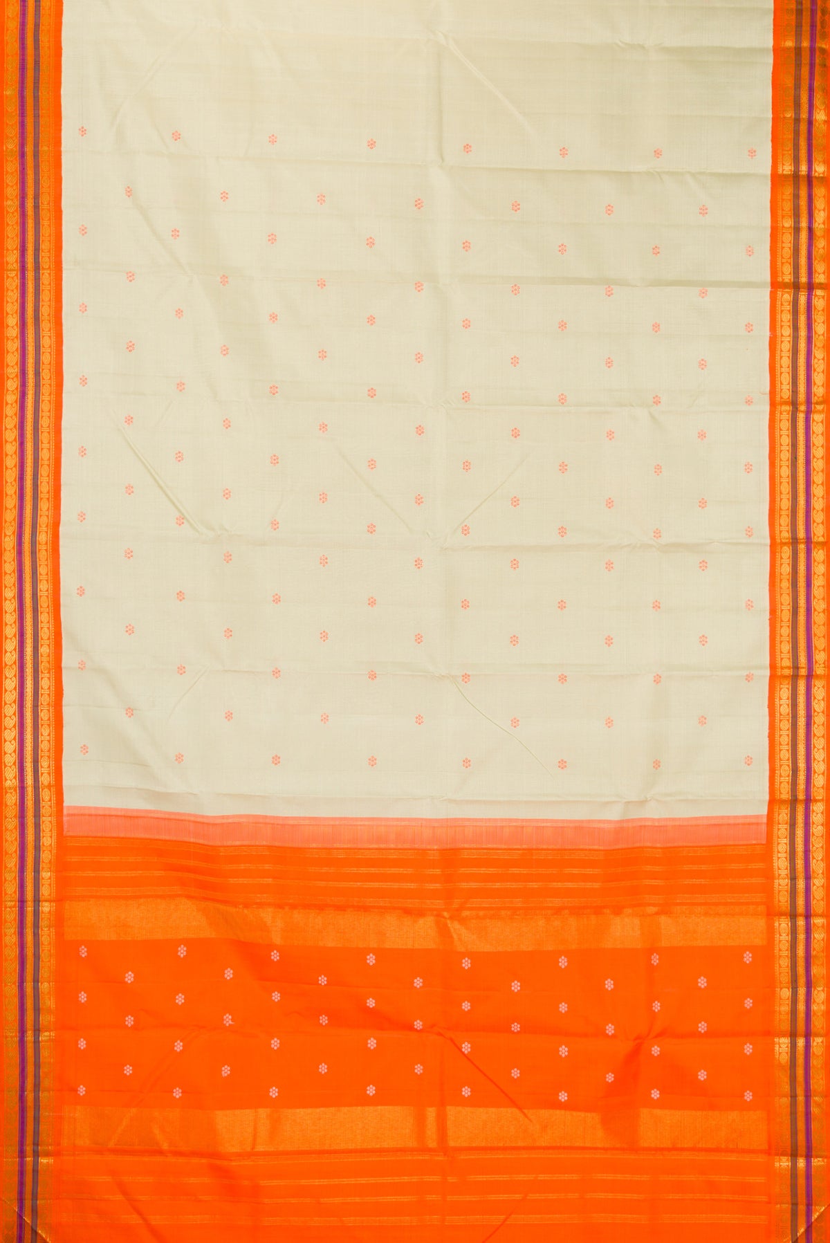 Flat view of Pure Silk Pista Green Kanjivaram Saree with Thread Butta on the body and Zari Border. 