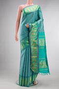 Pure Silk Turquoise Dual Tone Kanjivaram Saree with Thread Butta on the body and Fancy Border.  displayed on a mannequin