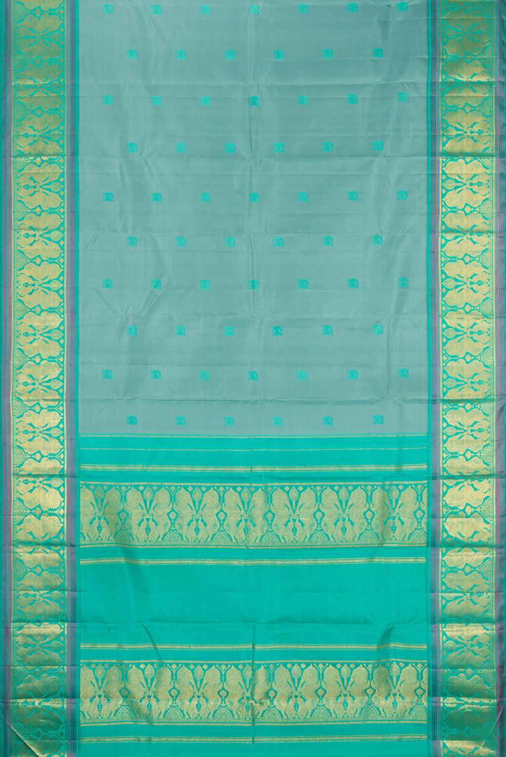 Flat view of Pure Silk Turquoise Dual Tone Kanjivaram Saree with Thread Butta on the body and Fancy Border. 
