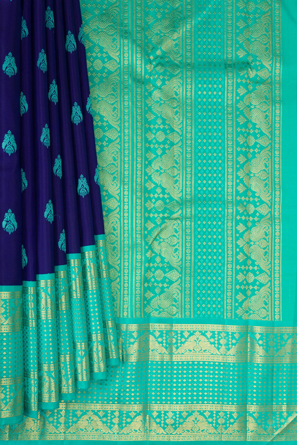 Pleats and pallu of Pure Silk Pure Zari Royal Blue Dual Tone Kanjivaram Saree with Thread Butta on the body and Zari Border. 