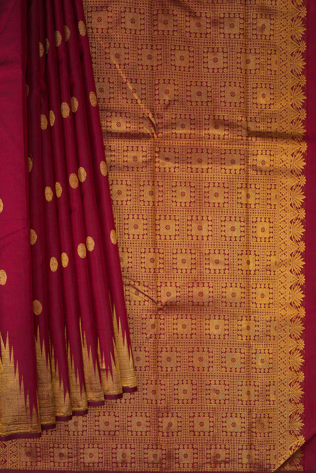 Pleats and pallu of Pure Silk Maroon Kanjivaram Saree with Zari Butta on the body and Temple Border. 