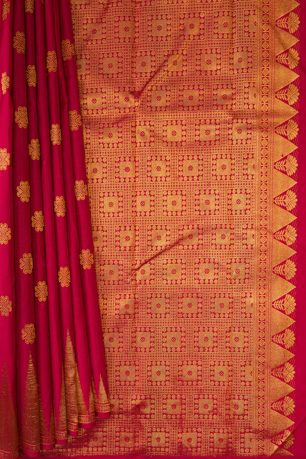 Pleats and pallu of Pure Silk Maroon Kanjivaram Saree with Zari Butta on the body and Fancy Border. 