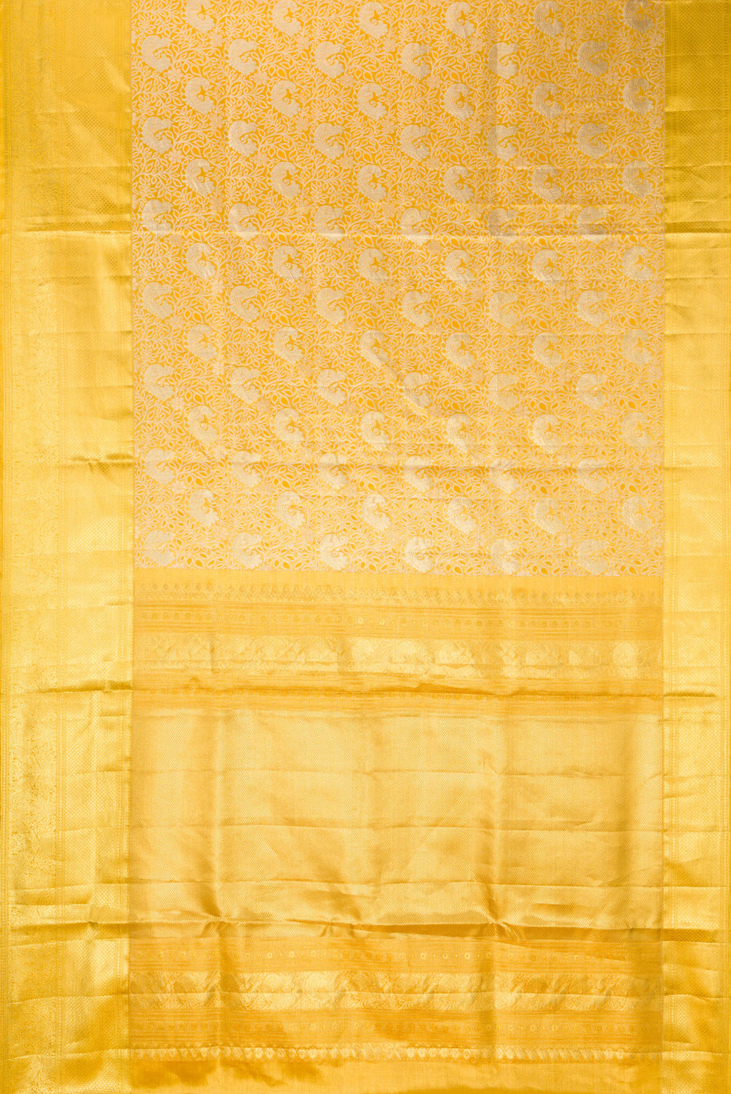 Flat view of Gold Dual Tone Kanjivaram Tissue Saree with Zari Brocade on the body and Zari Border. 