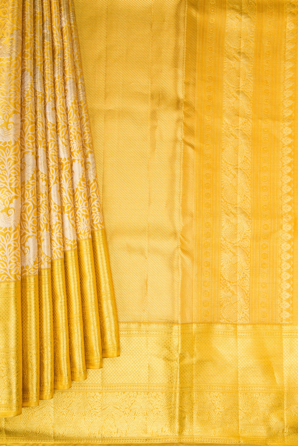 Pleats and pallu of Gold Dual Tone Kanjivaram Tissue Saree with Zari Brocade on the body and Zari Border. 