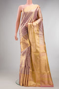 Rose Gold Dual Tone Kanjivaram Tissue Saree with Zari Brocade on the body and Zari Border.  displayed on a mannequin
