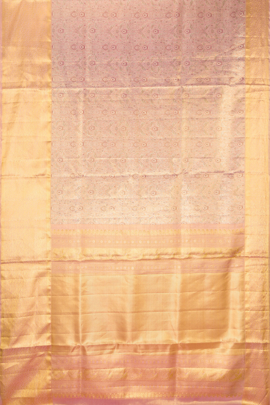Flat view of Rose Gold Dual Tone Kanjivaram Tissue Saree with Zari Brocade on the body and Zari Border. 