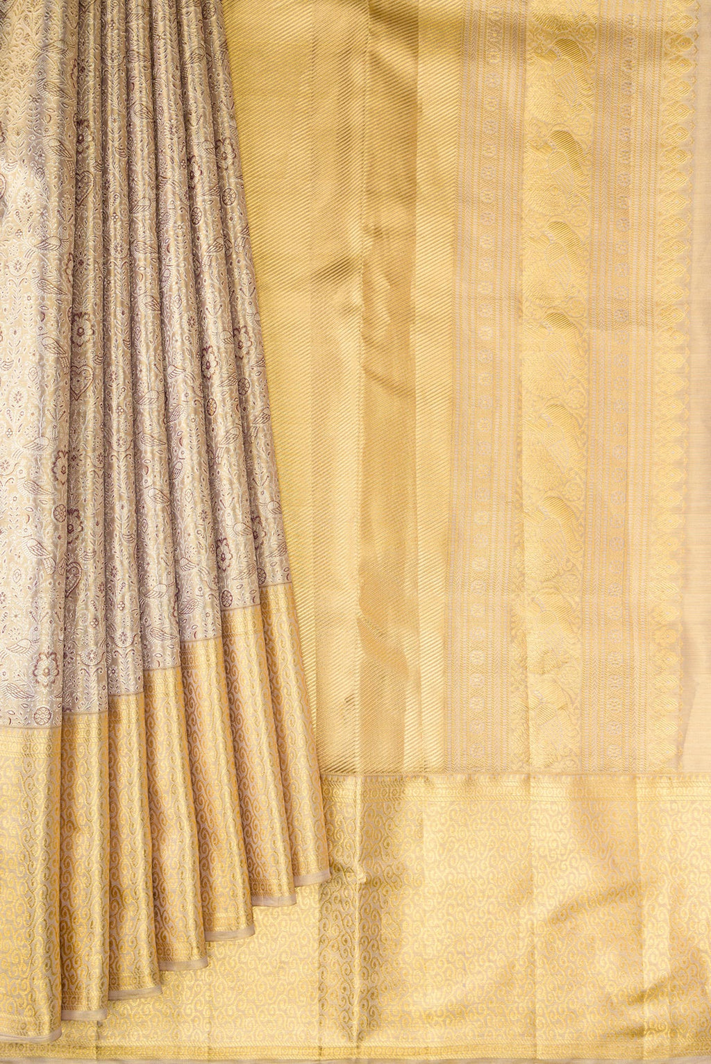 Pleats and pallu of Gold Dual Tone Kanjivaram Tissue Saree with Zari Brocade on the body and Zari Border. 