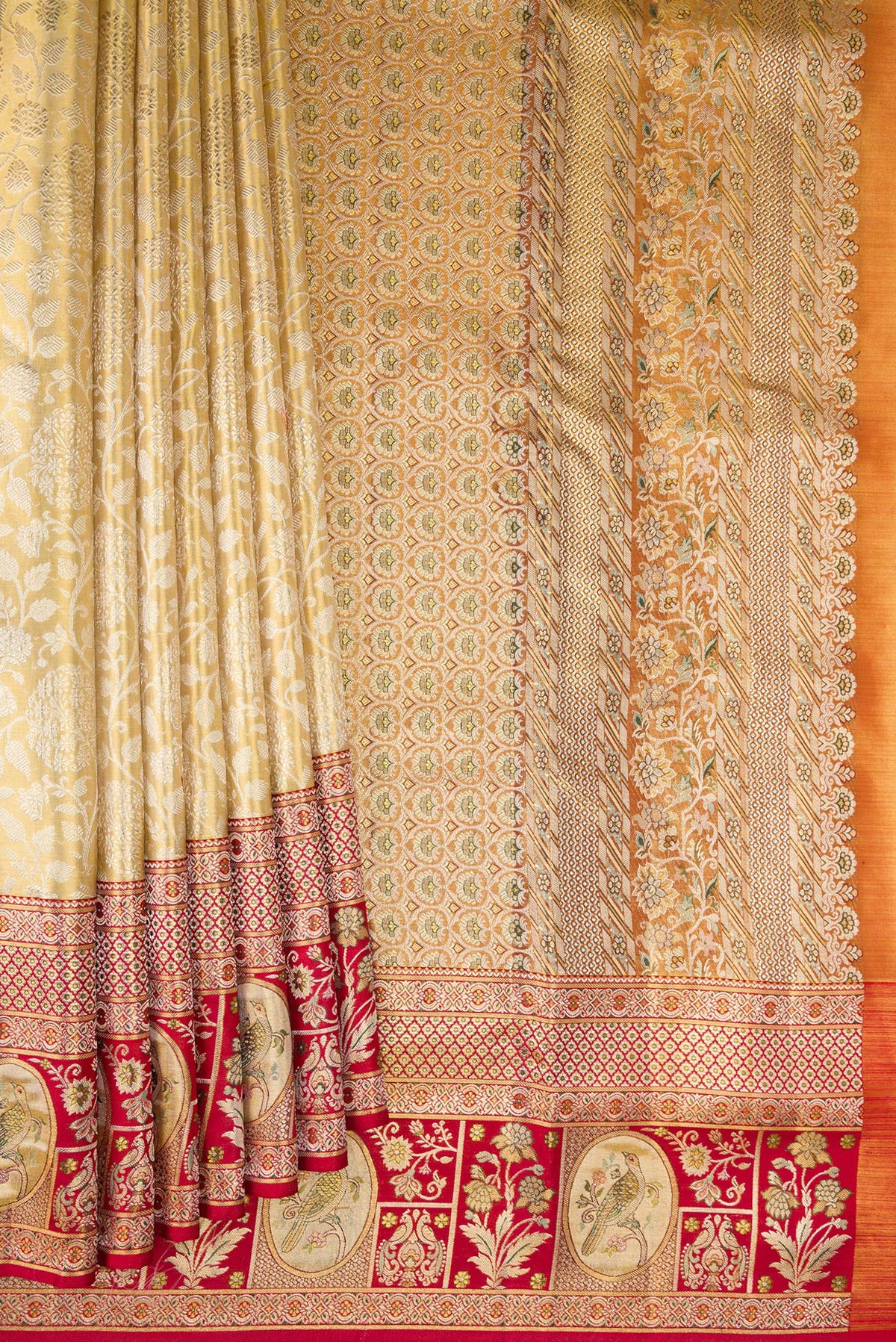 Pleats and pallu of Pure Silk Gold Dual Tone Kanchipuram Tissue Saree with Zari Brocade on the body and Fancy Border. 