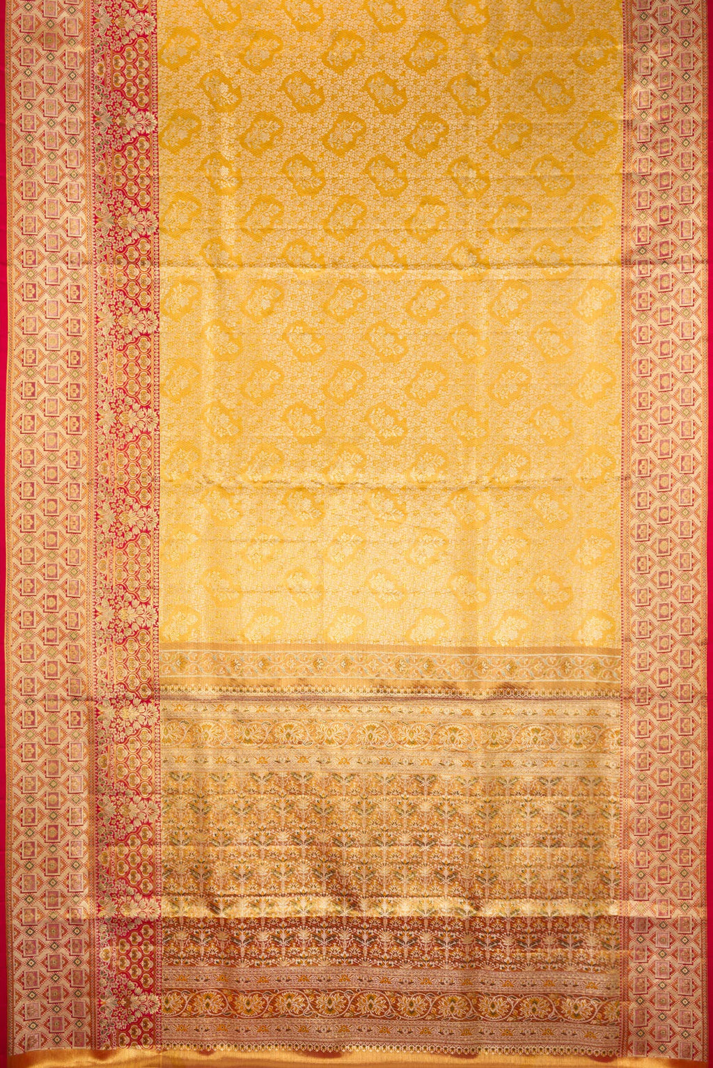 Flat view of Pure Silk Gold Dual Tone Kanchipuram Tissue Saree with Zari Brocade on the body and Fancy Border. 