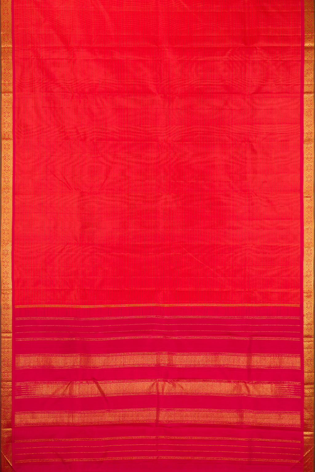 Flat view of Pure Silk Brick Orange Dual Tone Kanchipuram Saree with Stripes on the body and Zari Border. 