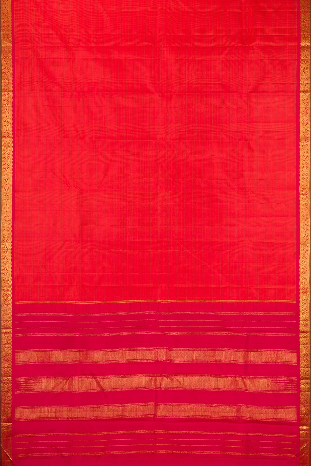 Flat view of Pure Silk Brick Orange Dual Tone Kanchipuram Saree with Stripes on the body and Zari Border. 