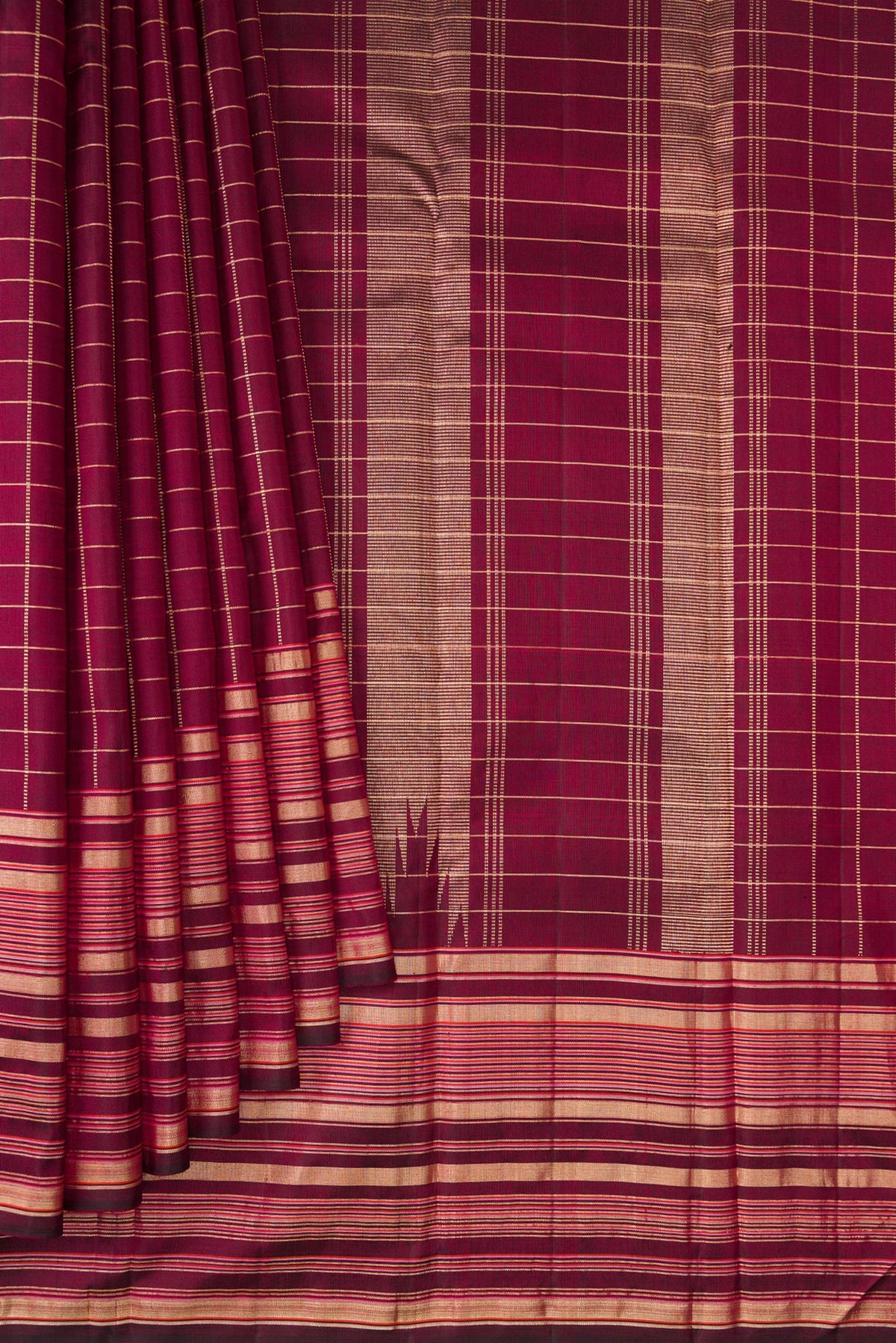 Pleats and pallu of Pure Silk Maroon Kanjivaram Saree with Checked design on the body and Zari Border. 