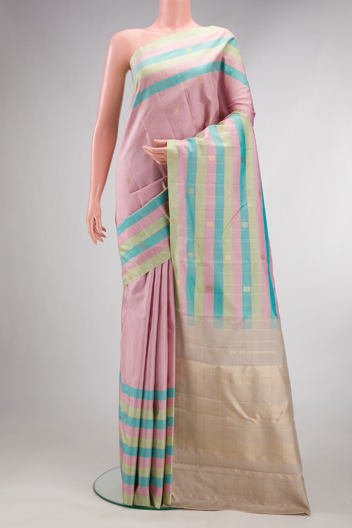 Pure Silk Pink Kanjivaram Saree with Zari Butta on the body and Checks Border.  displayed on a mannequin