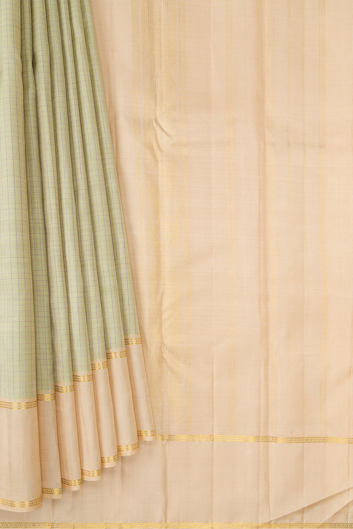 Pleats and pallu of Pure Silk Pista Green Kanchipuram Saree with Checked design on the body and Plain Border. 