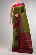 Pure Silk Bottle Green Kanjivaram Saree with Checked design on the body and Zari Border.  displayed on a mannequin