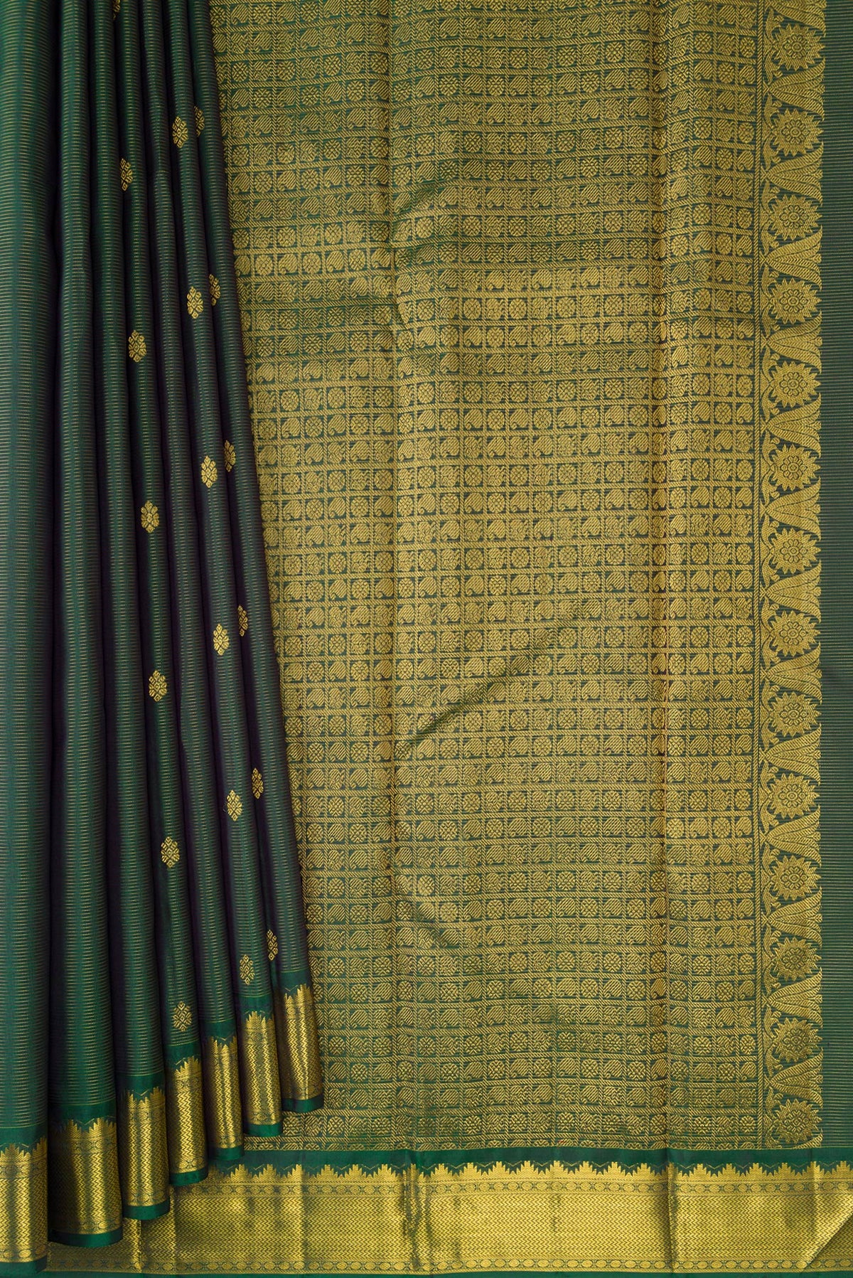 Pleats and pallu of Pure Silk Bottle Green Kanjivaram Saree with Zari Butta on the body and Zari Border. 