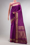 Pure Silk Purple Kanjivaram Saree with Stripes on the body and Zari Border.  displayed on a mannequin