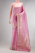 Pure Silk Pink Kanjivaram Saree with Checked design on the body and Fancy Border.  displayed on a mannequin