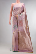 Lavender Kanchipuram Tissue Saree with Zari Brocade on the body and Fancy Border.  displayed on a mannequin