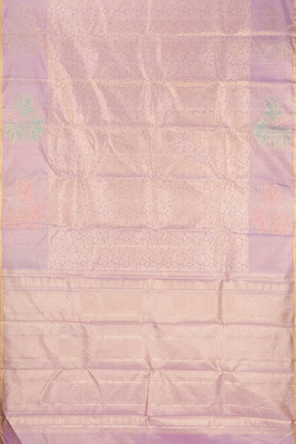 Flat view of Lavender Kanchipuram Tissue Saree with Zari Brocade on the body and Fancy Border. 