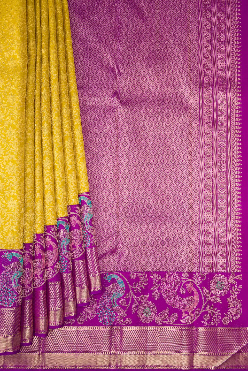 Pleats and pallu of Pure Silk Gold Dual Tone Kanchipuram Saree with Zari Brocade on the body and Fancy Border. 