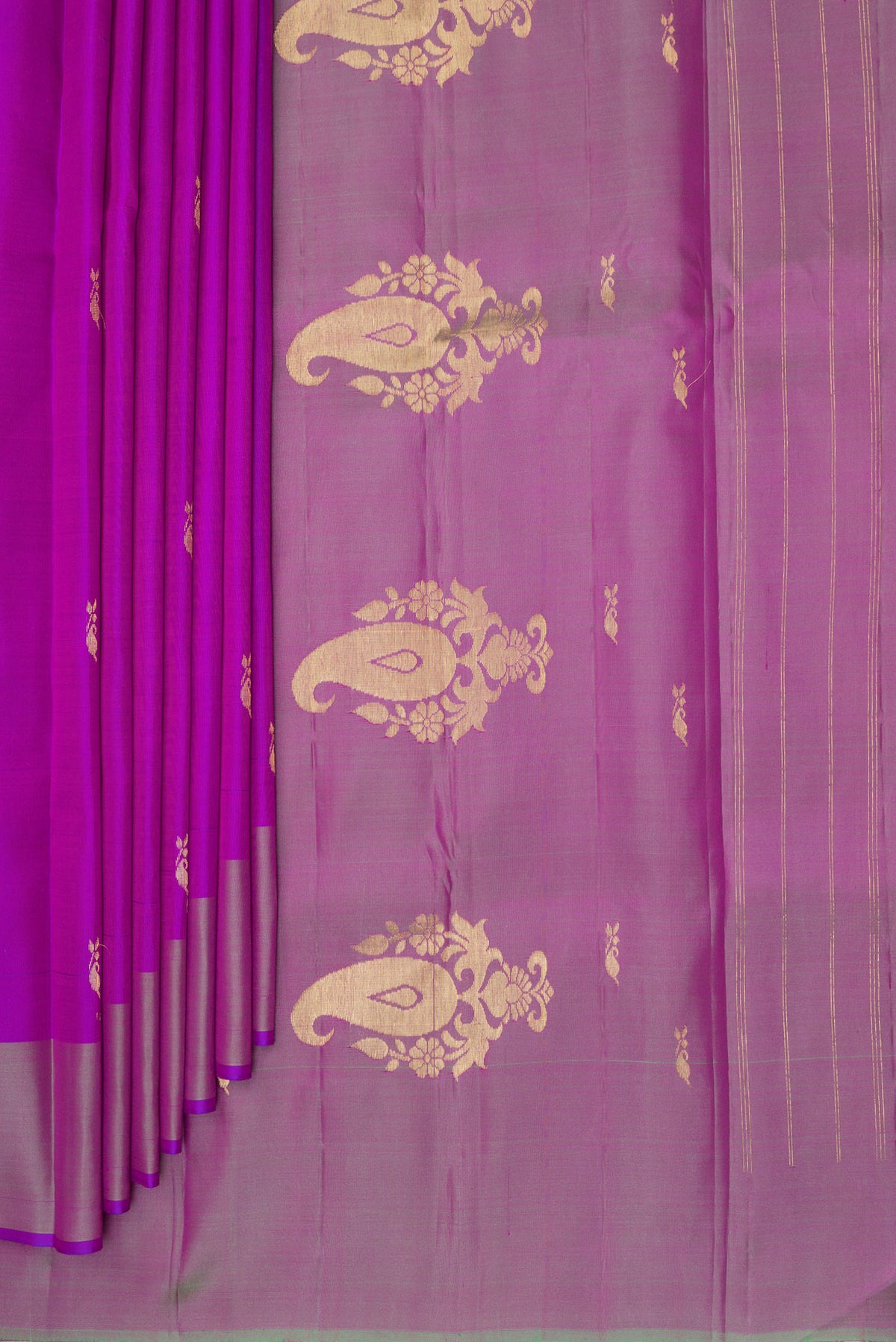 Pleats and pallu of Pure Silk Purple Kanchipuram Saree with Zari Butta on the body and Fancy Border. 