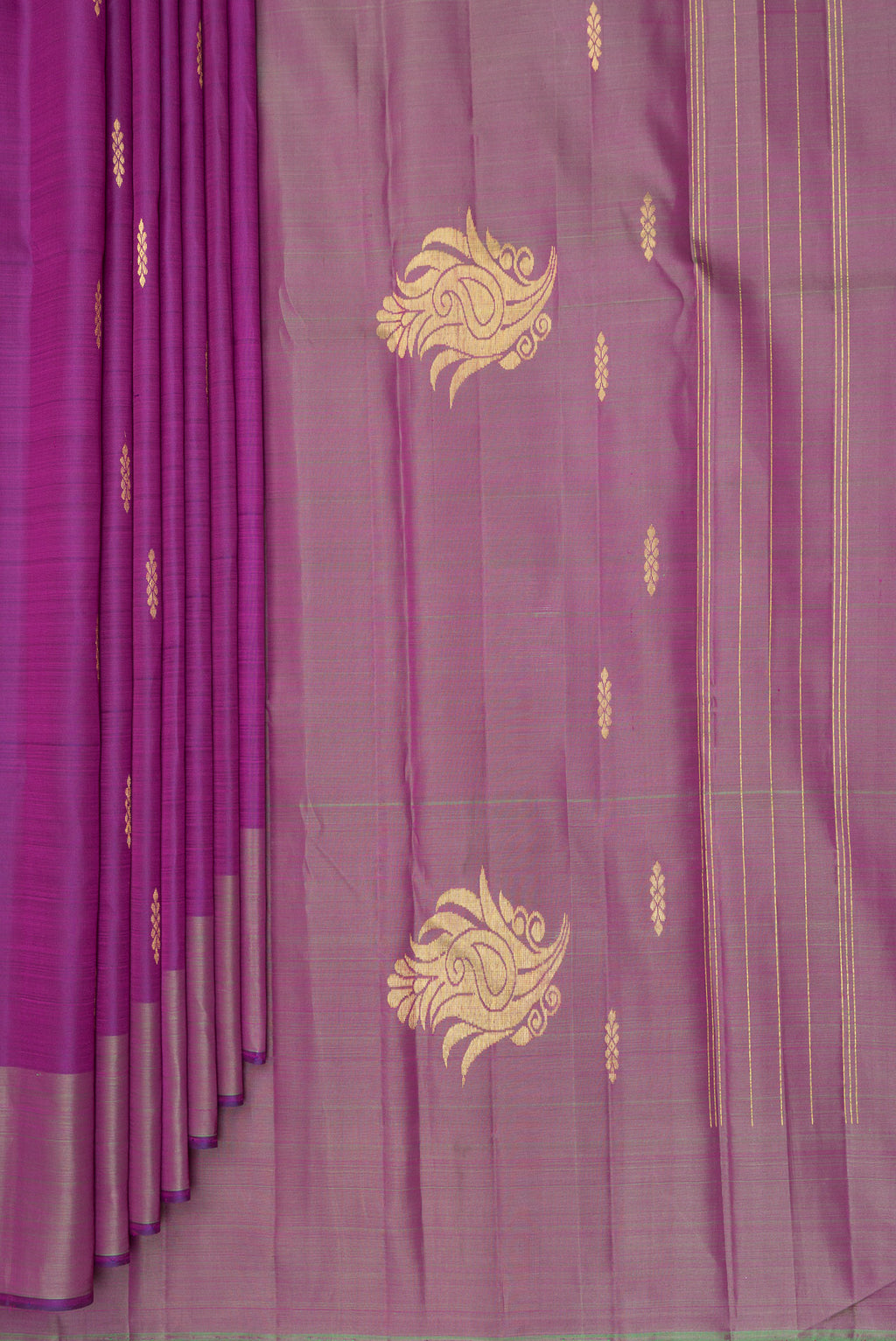 Pleats and pallu of Pure Silk Purple Kanchipuram Saree with Zari Butta on the body and Fancy Border. 