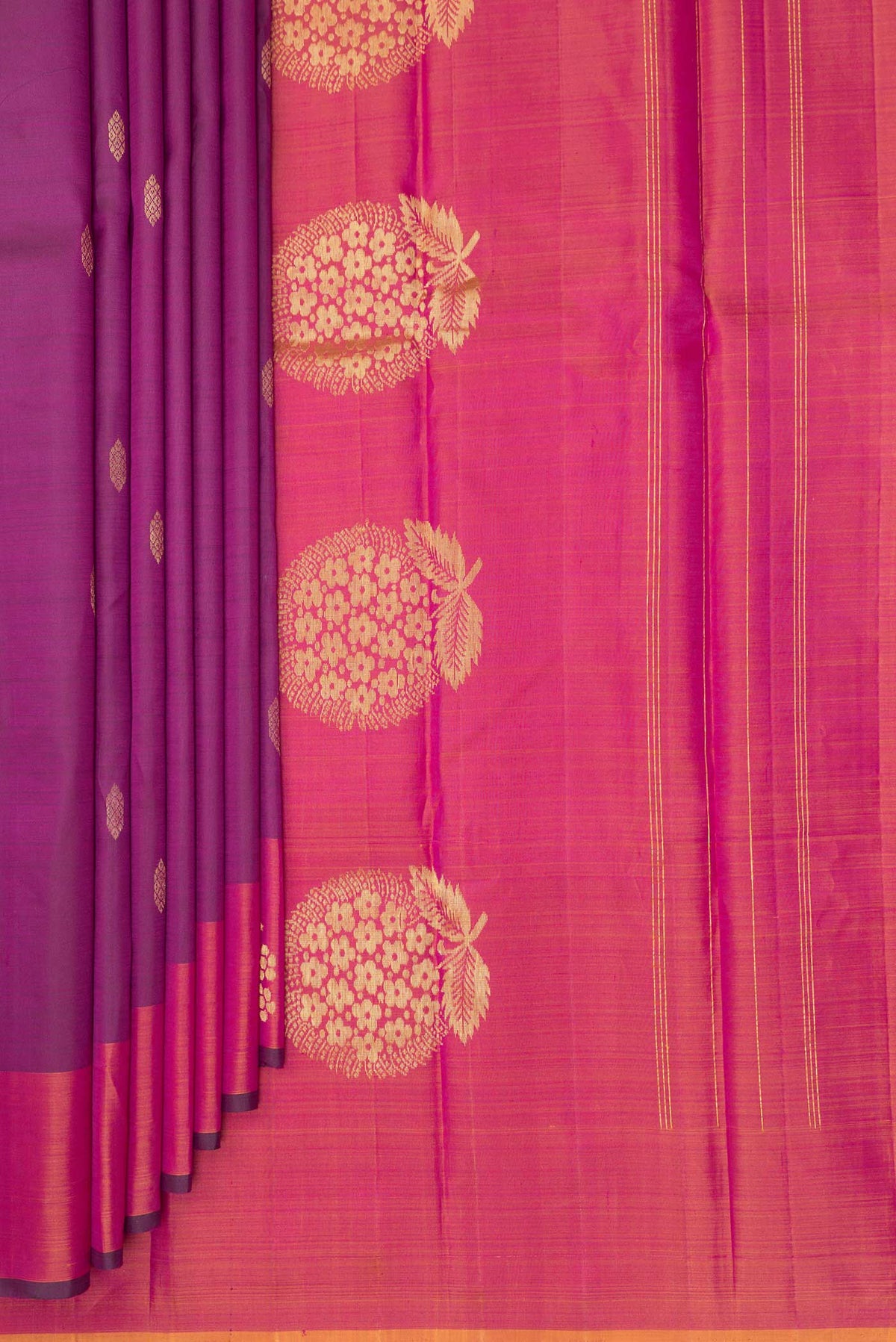 Pleats and pallu of Pure Silk Purple Kanchipuram Saree with Zari Butta on the body and Fancy Border. 