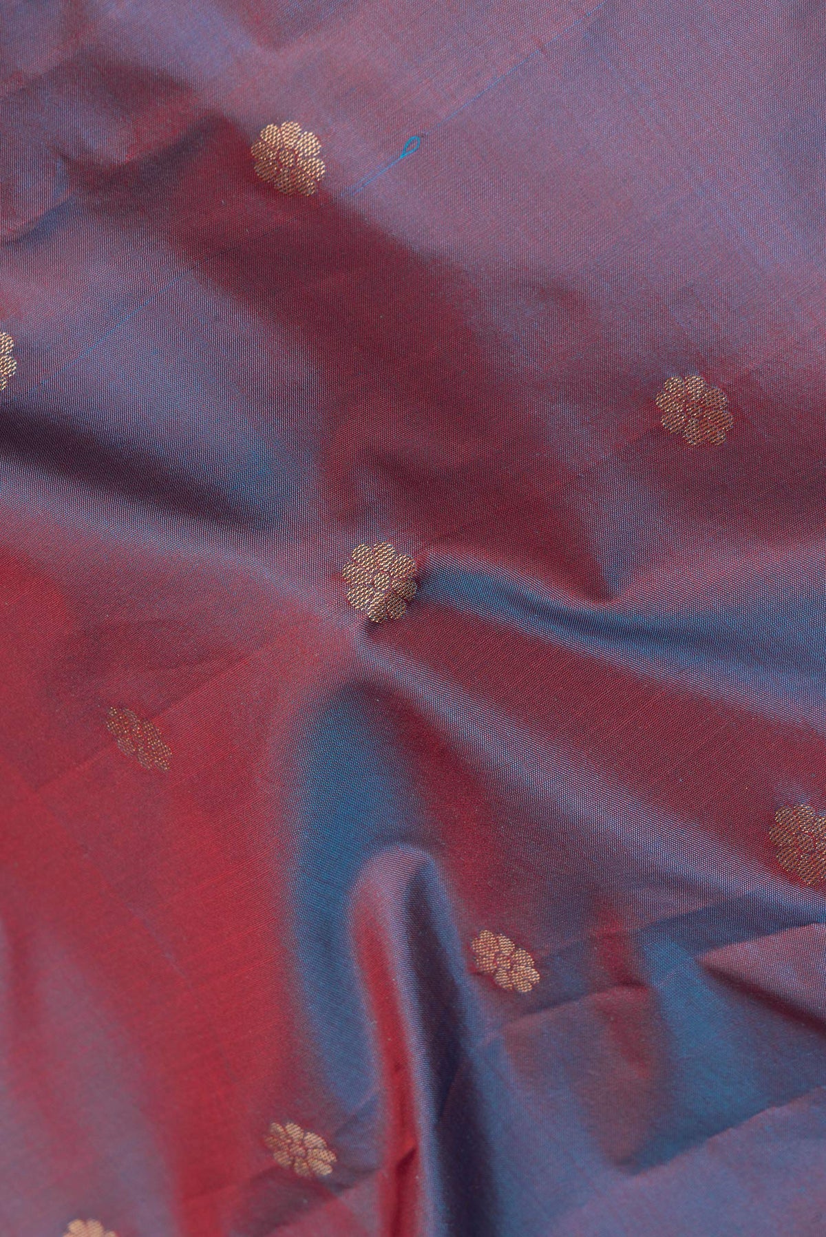 Close up of Multi Color Blended Paithani Silk Saree with Zari Butta on the body and Zari Border.  displaying folds