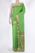 Parrot Green Blended Paithani Silk Saree with Zari Butta on the body and Zari Border.  displayed on a mannequin