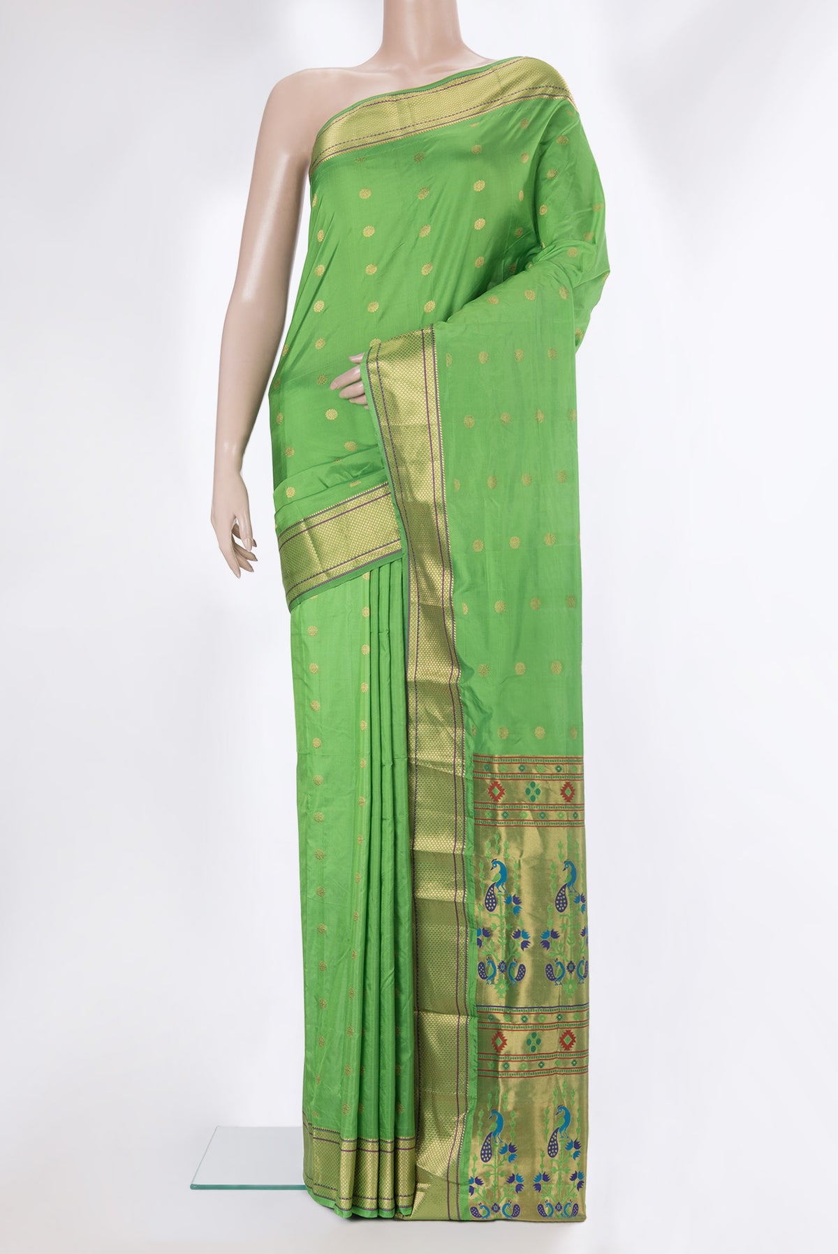 Parrot Green Blended Paithani Silk Saree with Zari Butta on the body and Zari Border.  displayed on a mannequin