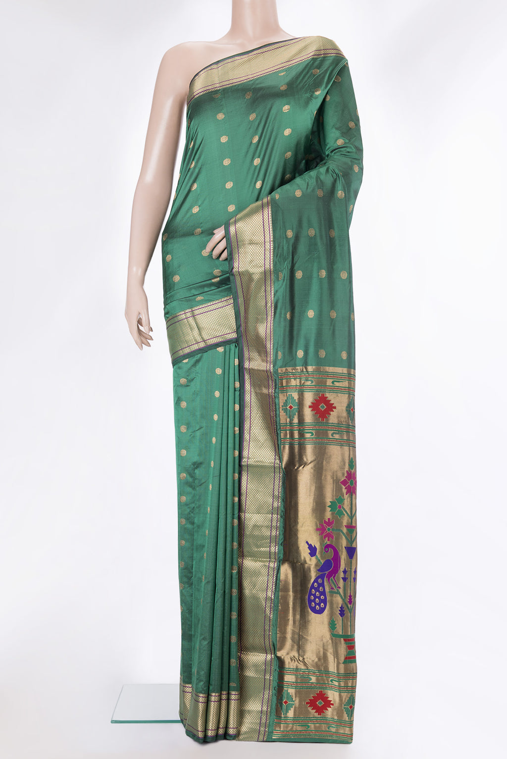 Green Blended Paithani Silk Saree with Zari Butta on the body and Zari Border.  displayed on a mannequin