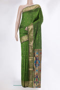 Mehandi Green Blended Paithani Silk Saree with Zari Butta on the body and Zari Border.  displayed on a mannequin