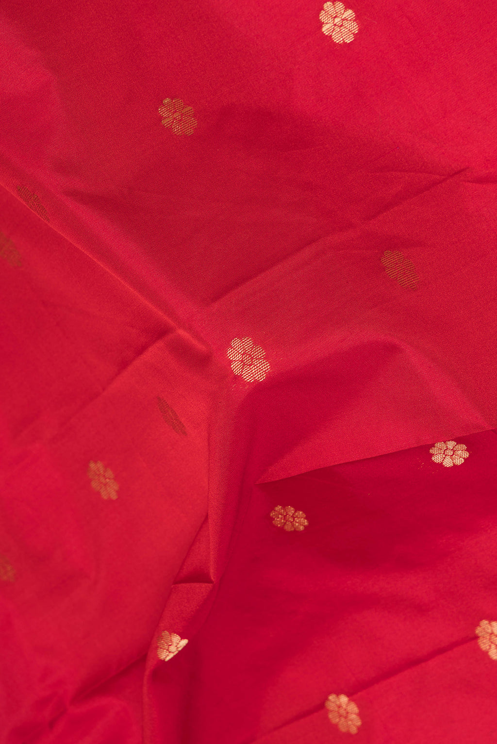 Close up of Red Blended Paithani Silk Saree with Zari Butta on the body and Zari Border.  displaying folds